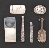 A COLLECTION OF PERSONAL SILVER ACCESSORIES