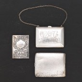 A GROUP OF THREE STERLING SILVER HOLDERS
