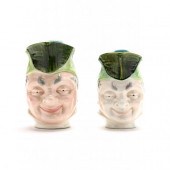 TWO SARREGUEMINES MAJOLICA FACE PITCHERS