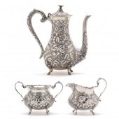 A STERLING SILVER REPOUSSE MINI COFFEE