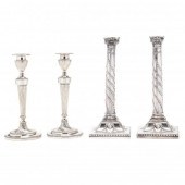 TWO PAIRS OF SILVER-PLATED CANDLESTICKS