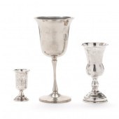 GROUP OF THREE SILVER KIDDUSH CUPS The