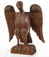 A FOLKY 19TH CENTURY CONTINENTAL CARVED