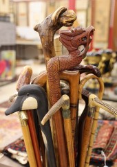 25pc Collection of Carved Walking Sticks