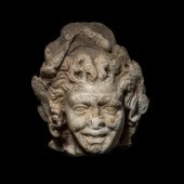 A Roman Marble Head of a Satyr
Circa