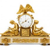 A Late Louis XVI Gilt Bronze and Marble