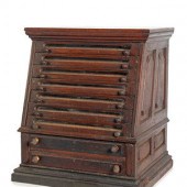 A Nine Drawer Counter Top Spool Cabinet
Late