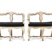 A Pair of Italian White Painted Settees
Early