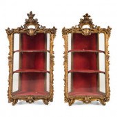 A Pair of Italian Giltwood Hanging Vitrines
Mid-19th