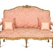 A Louis XV Style Carved  Giltwood Settee
Early