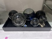 A GROUP OF SEVEN GLASS PAPERWEIGHTS