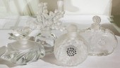 A GROUP OF FOUR LALIQUE PERFUME BOTTLES
