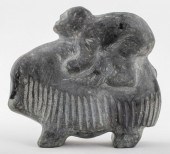 INUIT SOAPSTONE SCULPTURE OF A MAN AND