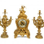 A Louis XV Style Gilt Bronze Clock