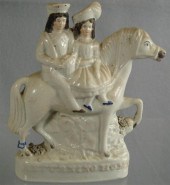 Staffordshire figurine of couple