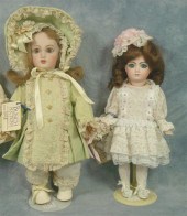 Two Reproduction bisque head dolls,