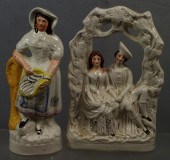 (2) Staffordshire figurines, fisherwoman,