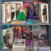 TWO SHELVES OF MOSTLY CASED BARBIE
