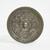 A Bronze Mirror With Seated Figures,