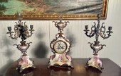 An antique three piece French clock