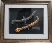TWO MIDDLE EASTERN DAGGERS WITH