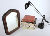 Desk light, mirror and book grouping