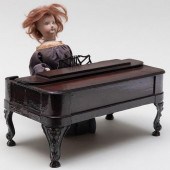 CAST METAL AND WOOD AUTOMATON PIANO