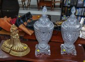 A PAIR OF CRYSTAL COVERED URNS