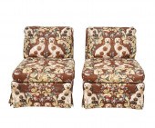Pair of Baker lounge chairs in