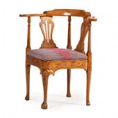A George III Beechwood Corner Chair
Late