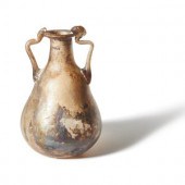 A Roman Pale Yellow Glass Bottle
Circa